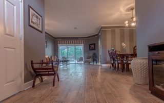 Wood-Look Tile Flooring in the living room from hallway