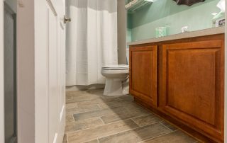 Wood-Look Tile Flooring in Bathroom