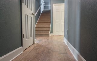 Wood-Look Tile Flooring in Hall up to stairs
