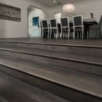 Custom Grey Oak Flooring In Dining Room with Steps