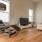 Wire-Brushed Natural Hickory Wood Flooring in Living Room with Modern Looking Chair