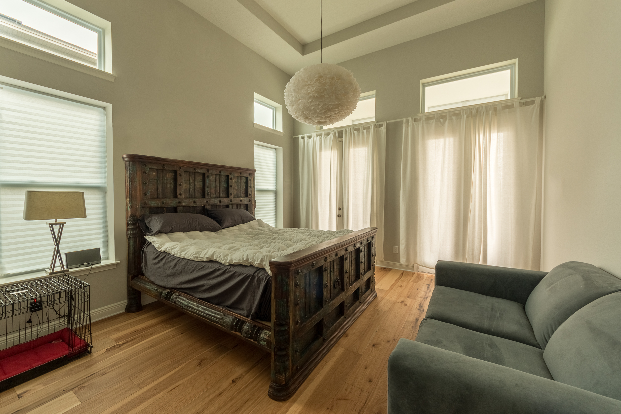 Wire-Brushed Natural Hickory Wood Flooring in Bedroom with Curtains Drawn