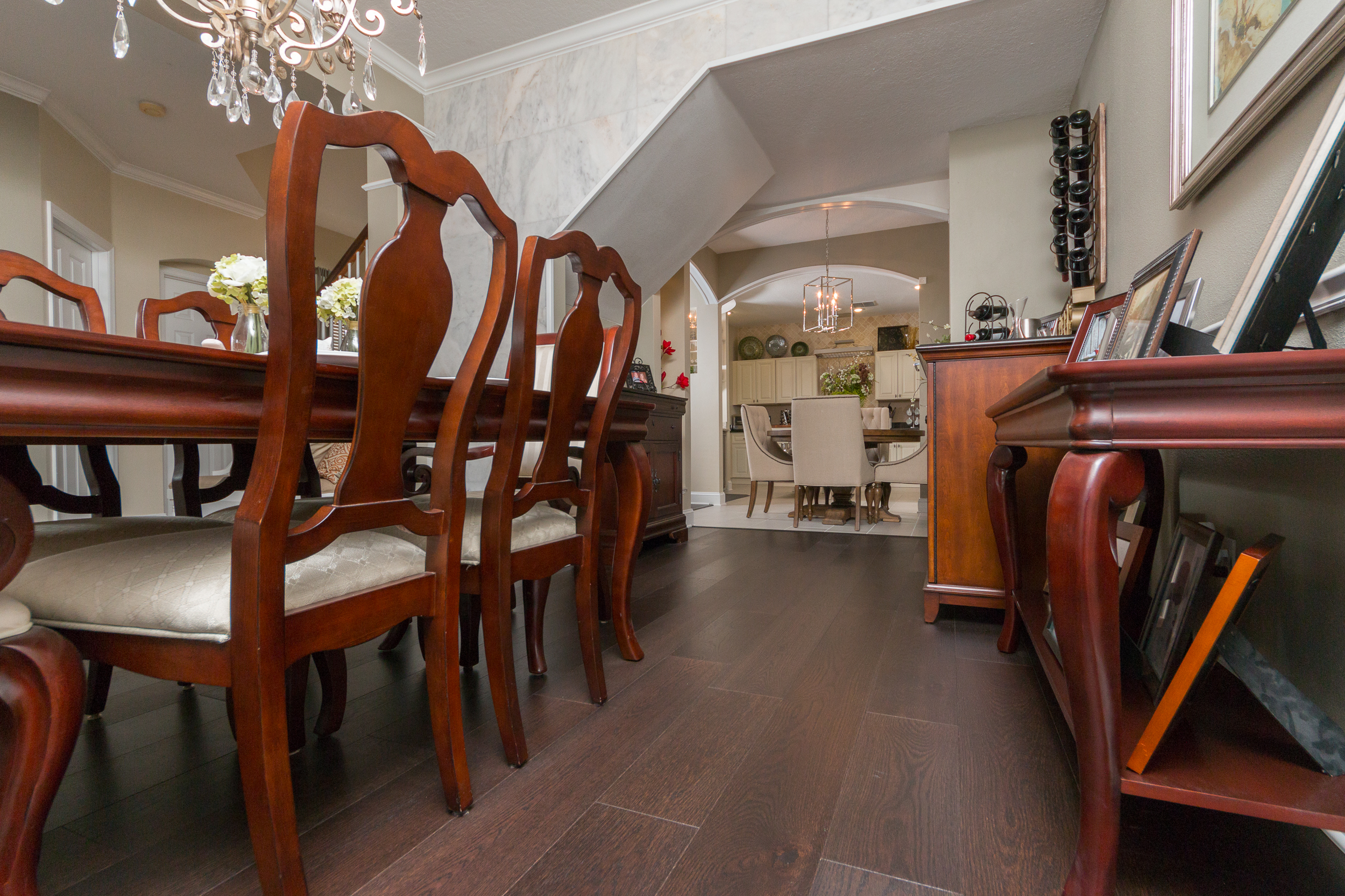 Mellow Oak Wood Flooring with Tile in Dining Room with cherry wood furniture