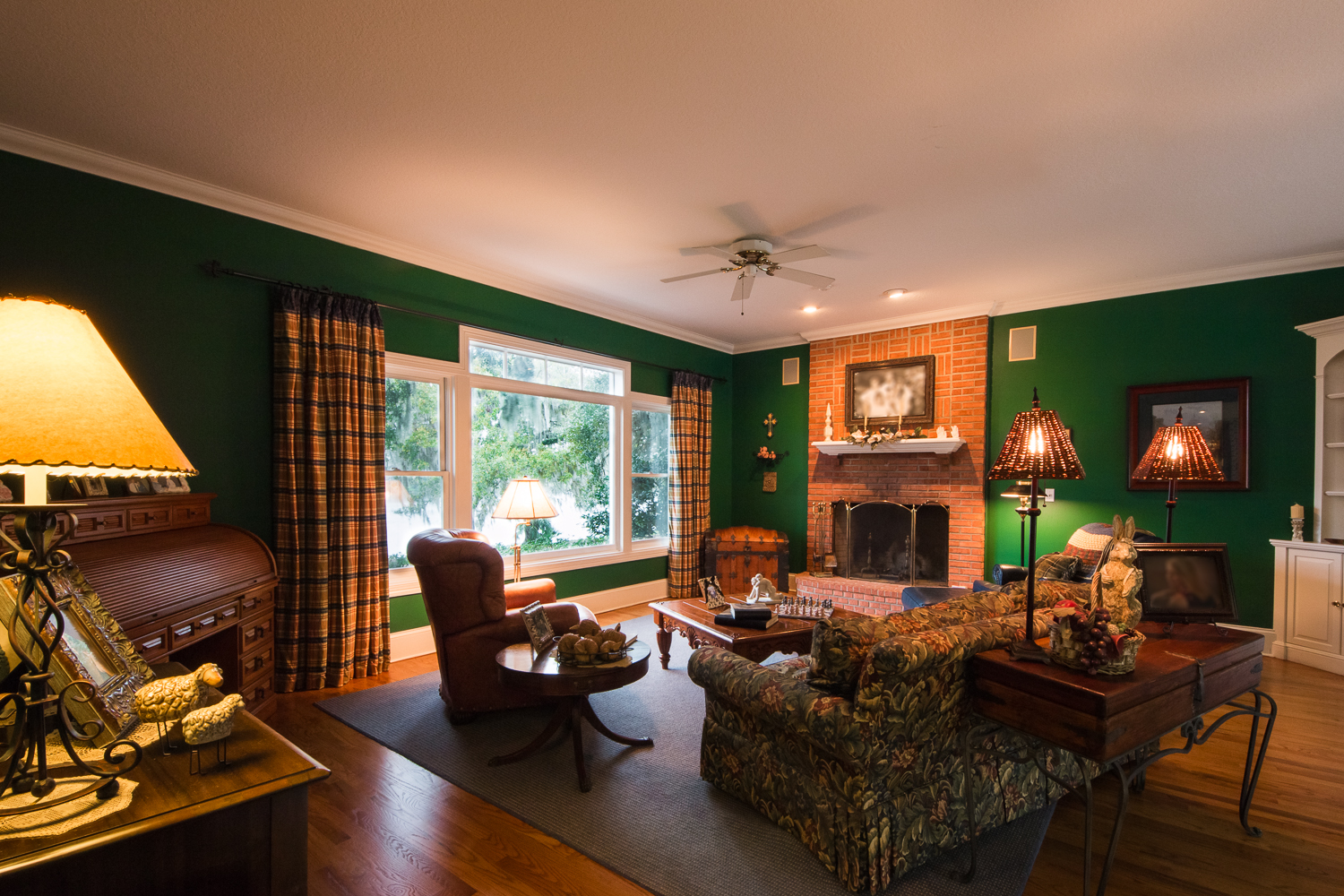 Gunstock Solid Oak flooring living room with fireplace
