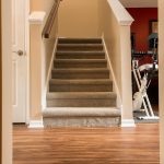 PVC Vinyl & Gray Carpet flooring stairwell, hallway and workout area
